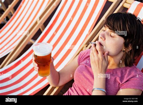 Woman Smoking Cigarette Drinking Alcohol High Resolution Stock