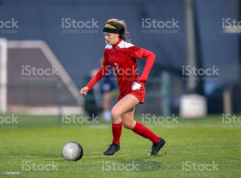 High School Girl Playing Soccer Stock Photo Download Image Now