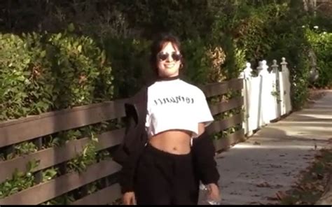senorita singer camila cabello teases fans by lifting her crop top and showing off her bra in