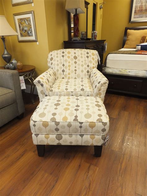 Your man cave's chair should feel like home. Super cute chair and ottoman in fresh, bright upholstery ...