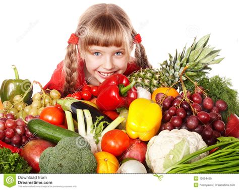 Het Meisje Van Het Kind Met Groep Groente En Fruit Stock Afbeelding