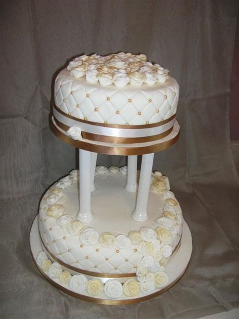 Gold And Ivory Wedding Cake Decorated Cake By Tracey Cakesdecor