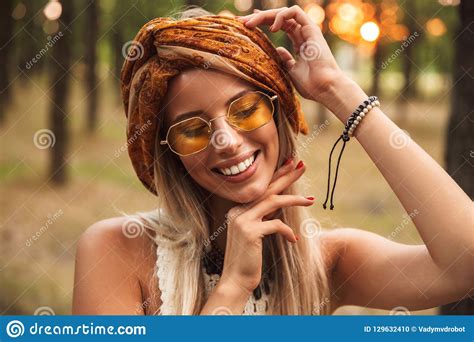 Photo Of Joyful Hippie Woman Wearing Stylish Accessories Smiling While