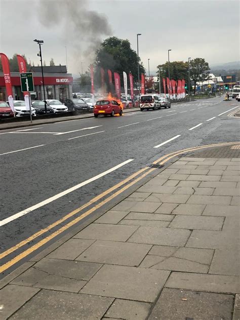 Major Road Shut After Car Bursts Into Flames In Bury Manchester