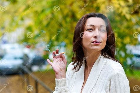 Attractive Mature Woman Smoking Outside Stock Photo Image Of Habit