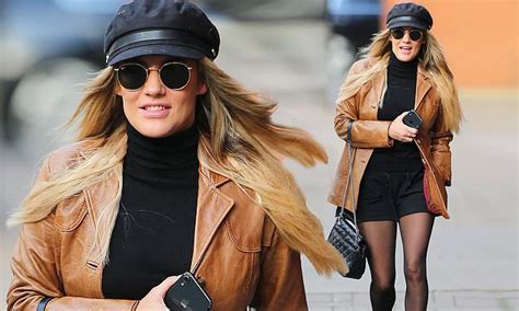 Caroline Flack Puts On A Leggy Display In Black Shorts And Suede Boots Daily Mail Online