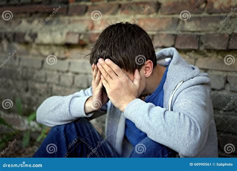 Sad Teenager By The Wall Stock Image Image Of Misery 60990561