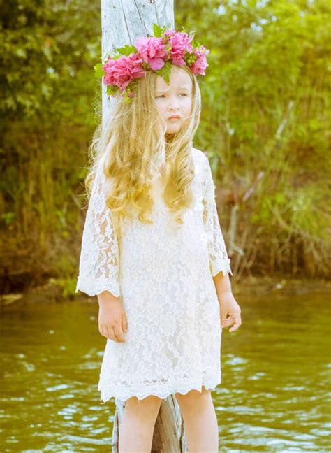 Group of girls having break in practice, sitting on floor. Best Flower Girl Dresses: Stylish Flower Girl Dresses for ...