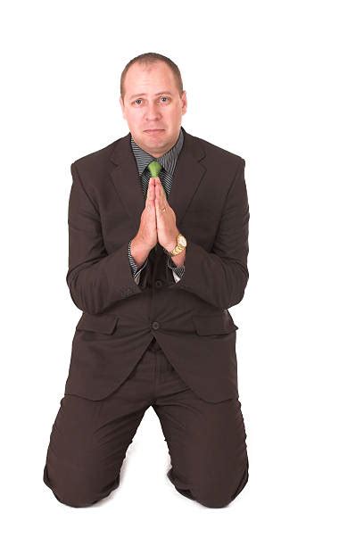 Royalty Free Man In Suit On Knees Begging Pictures Images And Stock