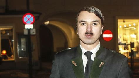 Hitler Lookalike Charged With Glorifying Nazis