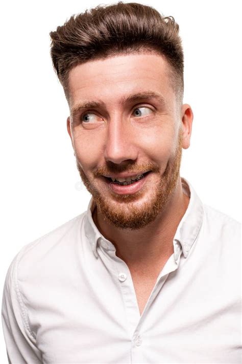 Studio Photo Of A Good Looking Man In A White Shirt Isolated Over A