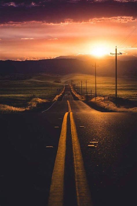 Sunset Of A Deserted Road Showing Great Leading Lines Composition