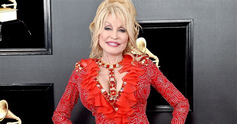 dolly parton explains that she covers every scar she gets with tattoos of flowers or little
