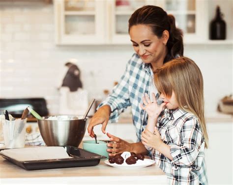 Mom With Her 4 Years Old Daughter Are Cooking In The Kitchen To Mothers Day Stock Image Image