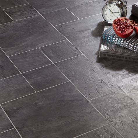 These black slate effect tiles can add a natural element to any floor or wall. Harmonia Black Slate Tile Effect Laminate Flooring | Floor ...