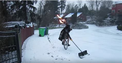 Here Is A Guy Shoveling Snow Dressed As Darth Vaderon A Unicyclewhile