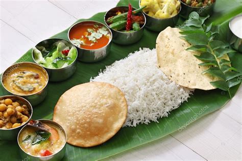 Get 10% discount on online orders. South indian meals served on banana leaf — Stock Photo ...