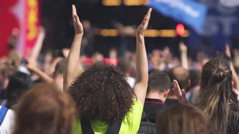 Iconic Rock Concert Front Row Crowd Cheering Hands In Air Stock Footage