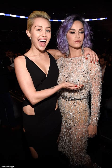 Miley Cyrus Playfully Fondles Fellow Pop Princess Katy Perry S Chest At