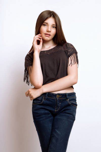 beautiful  years  girl dressed  jeans   shirt  studio