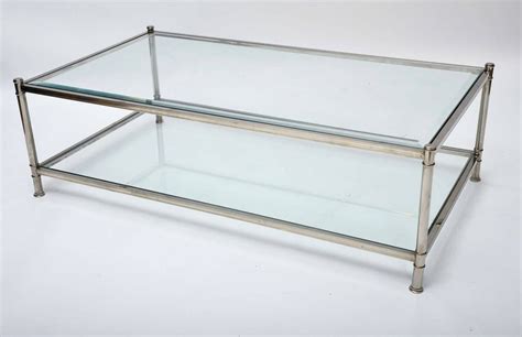 It provides a combination of modern and classic elements. 30 Collection of Chrome and Glass Coffee Tables