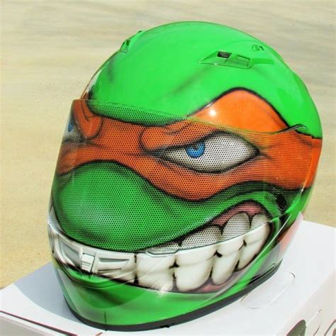 The most effective and important safety measure a motorcyclist can invest in is the helmet. Ninja Turtles Michelangelo Custom Painted motorcycle ...