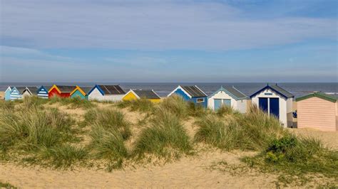 Premium Photo Beach Huts With Sand Dunes At Southwold On The Suffolk