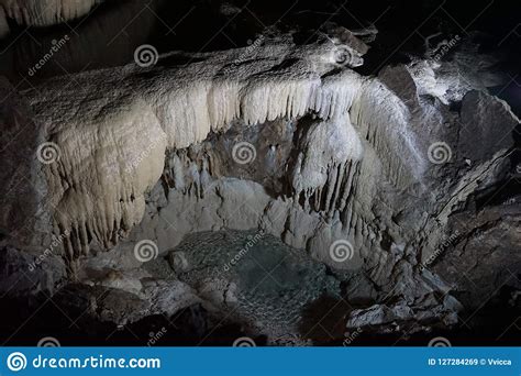 Underground Caves Of Abkhazia Stalactites And Stalagmites In The Dark