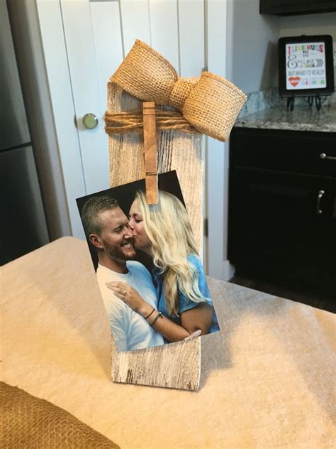 Rustic Bridal Shower Made These Photo Holders From Old Wood Dowel