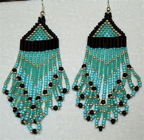 Hand Made Turquoise Beaded Earrings With Gold And Black Accents Made