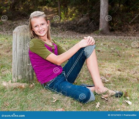 Pretty Girl Sitting Outdoors Stock Image Image Of Youth Young 23167423