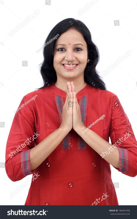 Smiling Young Woman Greeting Namasthe Against Stock Photo 186491450