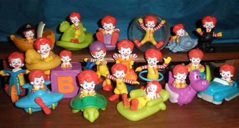 A small toy is included with the food, both of which are usually contained in a red cardboard box with a yellow smiley face and the mcdonald's logo. Toddler Ronald McDonald | Happy Meal Under 3 Toddler Toys ...