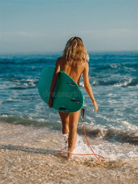 Naked Surfer Girl With Surfboard On Tropical Beach Harmony With Nature Stock Photo Image Of