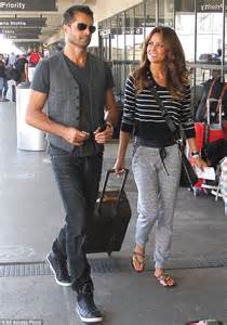 Brooke Burke Gives Husband David Charvet A Loving Look As They Fly Out