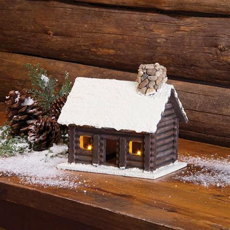 Lighted Snowy Log Cabin Made Of Real Wood To Look Like An Authentic