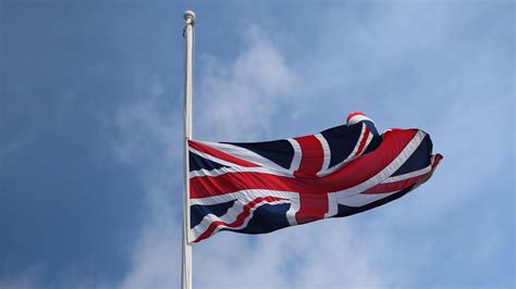The canadian flag is flown at half mast to represent mourning. Union flags fly at half mast on Government buildings - ITV ...