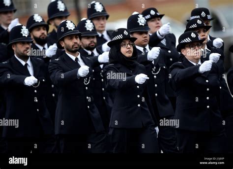 new metropolitan police officers during their passing out parade at the police academy in hendon