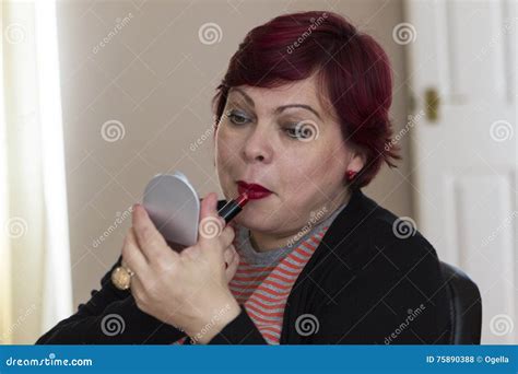 Mature Woman With Mirror And Lipstick Stock Photo Image Of Posing