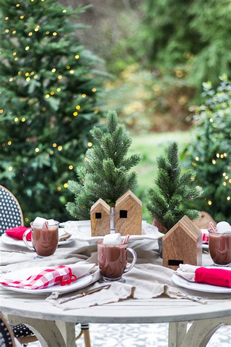From tables to chairs, there are plenty of outdoor patio and backyard ideas to choose from that will create comfortable and relaxing hangout for summer fun. Simple Outdoor Christmas Table Decorating - A Christmas Tablescape Tour - zevy joy