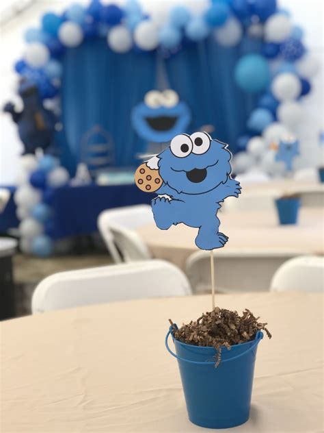 With these cheap baby shower ideas you can host an amazing baby shower on a budget. Cookie Monster centerpiece first birthday party | Baby ...