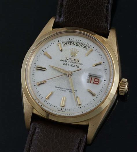 We do not favor unallocated gold. Vintage Rolex President Day Date model, 6612 with papers ...