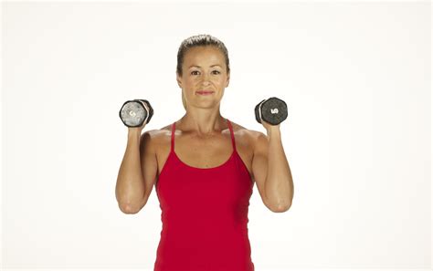 How To Do A Standing Overhead Press With Dumbbells Popsugar Fitness