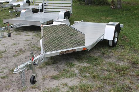 Not all ramps, trailers and vehicle are created equal so it's imperative that you only use equipment designed to support the weight of your motorcycle after you've loaded your motorcycle into your trailer, the front wheel of your bike should be chocked to prevent it from turning or moving in any way. Aluminum Motorcycle Trailer for Sale