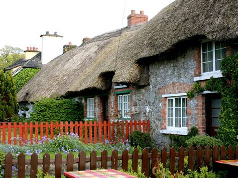 Western ireland vacation cottage rental. Ireland: Cottages along the street in Adare Village,County ...