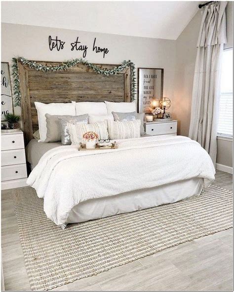 A wood trimmed tufted lavender bed anchors this expansive guest bedroom. 25 Small Master Bedroom Makeover Ideas On A Budget 6 ...