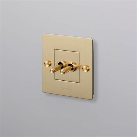 1g Double Retractive Toggle Switch Brass Buster Punch