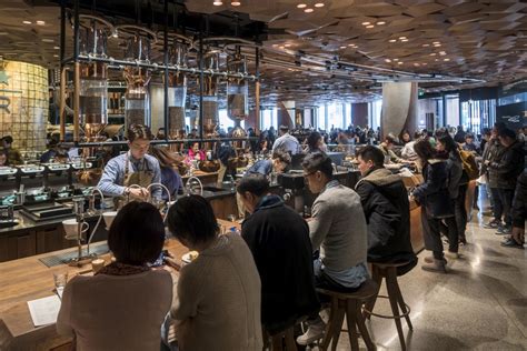 In Pictures Coffee Lovers In Shanghai Get Biggest Starbucks In The