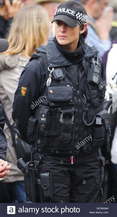 Armed Female Police Officer On Duty In Salisbury Wiltshire Stock
