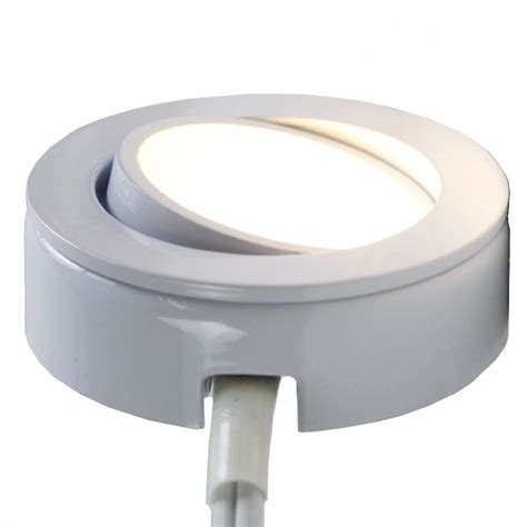 Direct wire/linkable fixture mounts with an adhesive backing, or in a track or channel. 120v Puck Light Direct Wire | Shelly Lighting